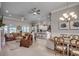 Open-concept living space with hardwood floors, modern lighting, and ample seating at 2004 Via Palma Dr., North Myrtle Beach, SC 29582