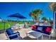 Entertain on the patio with an outdoor dining area, firepit, and comfortable seating at 2004 Via Palma Dr., North Myrtle Beach, SC 29582