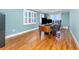 Home office with hardwood floors, large desk, and ocean views at 2179 South Waccamaw Dr., Garden City Beach, SC 29576