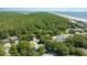 Aerial view of beachfront property with lush surroundings at 245 Windover Dr., Pawleys Island, SC 29585