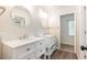 Modern bathroom with double vanity, granite countertop, and walk-in shower at 245 Windover Dr., Pawleys Island, SC 29585