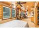 Large basement bedroom with wood walls and home office at 245 Windover Dr., Pawleys Island, SC 29585