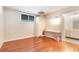 Light and airy bedroom with wood floors and a window at 245 Windover Dr., Pawleys Island, SC 29585