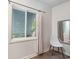 Charming bedroom with window, shutters, and a white chair at 245 Windover Dr., Pawleys Island, SC 29585