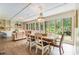 Dining room with large windows, built-in shelving, and a view to the backyard at 245 Windover Dr., Pawleys Island, SC 29585