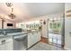 Kitchen with granite countertops, stainless steel appliances, and views to the sunroom at 245 Windover Dr., Pawleys Island, SC 29585
