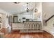 Kitchen with white cabinets, granite countertops, and an island with seating at 245 Windover Dr., Pawleys Island, SC 29585