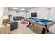 Basement recreation area with pool table and sofa at 2557 Pete Dye Dr. # 903, North Myrtle Beach, SC 29582