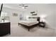 Spacious bedroom with ceiling fan, large bed, and walk-in closet at 2557 Pete Dye Dr. # 903, North Myrtle Beach, SC 29582
