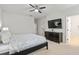 Main bedroom with a large bed, TV, dresser and access to bathroom at 2557 Pete Dye Dr. # 903, North Myrtle Beach, SC 29582