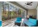 Peaceful deck features wooded views and comfortable outdoor furniture at 2557 Pete Dye Dr. # 903, North Myrtle Beach, SC 29582