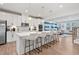 Modern kitchen with white cabinets and large island at 2557 Pete Dye Dr. # 903, North Myrtle Beach, SC 29582