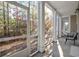 Relaxing screened porch overlooking wooded area at 2557 Pete Dye Dr. # 903, North Myrtle Beach, SC 29582