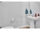 Clean and modern bathroom with pedestal sink and updated fixtures at 299 Empyrean Circle, Myrtle Beach, SC 29588