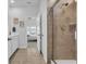 Elegant bathroom with double sinks, a large shower, and tile floors at 299 Empyrean Circle, Myrtle Beach, SC 29588