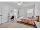 Spacious bedroom with a comfortable bed, desk, and en-suite bathroom at 299 Empyrean Circle, Myrtle Beach, SC 29588