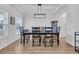 Dining room with a wooden table and six chairs at 299 Empyrean Circle, Myrtle Beach, SC 29588