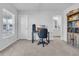 Bright home office features built-in shelving and ensuite bathroom access at 299 Empyrean Circle, Myrtle Beach, SC 29588