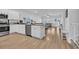 Kitchen with white cabinets, granite countertops, and stainless steel appliances at 299 Empyrean Circle, Myrtle Beach, SC 29588