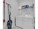 Convenient laundry room with washer, dryer, and ample storage at 299 Empyrean Circle, Myrtle Beach, SC 29588