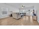 Bright living room with hardwood floors and sliding glass doors at 299 Empyrean Circle, Myrtle Beach, SC 29588