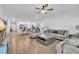 Open living space with hardwood floors, comfortable seating and kitchen views at 299 Empyrean Circle, Myrtle Beach, SC 29588