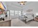 Large main bedroom with a ceiling fan and plenty of natural light at 299 Empyrean Circle, Myrtle Beach, SC 29588