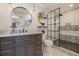 Modern bathroom with a walk-in shower and dark vanity at 3658 Edwards Rd., Aynor, SC 29511