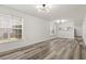 Open living room with kitchen pass-through at 4251 Villas Dr. # 303, Little River, SC 29566