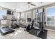 Well-lit fitness center with treadmills, stationary bikes, and weight machines at 4518 N Plantation Harbour Dr. # G-1, Little River, SC 29566