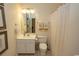 Clean bathroom with single vanity and shower/tub combo at 4617 Lightkeepers Way # 9-I, Little River, SC 29566