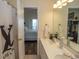 Clean bathroom with double vanity and shower/tub combo at 4617 Lightkeepers Way # 9-I, Little River, SC 29566