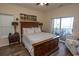 Spacious Primary bedroom with large bed and private balcony access at 4617 Lightkeepers Way # 9-I, Little River, SC 29566