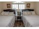 Guest bedroom with two twin beds and shared bath at 4617 Lightkeepers Way # 9-I, Little River, SC 29566