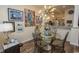 Bright dining area with glass top table and a view to kitchen at 4617 Lightkeepers Way # 9-I, Little River, SC 29566