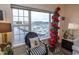 Living room with comfortable seating and stunning water views at 4617 Lightkeepers Way # 9-I, Little River, SC 29566