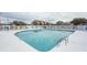 Community swimming pool with surrounding patio at 4617 Lightkeepers Way # 9-I, Little River, SC 29566