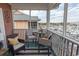 Relaxing screened balcony overlooking marina; wicker furniture and harbor views at 4617 Lightkeepers Way # 9-I, Little River, SC 29566