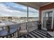 Spacious screened balcony boasts marina views and comfortable seating at 4617 Lightkeepers Way # 9-I, Little River, SC 29566