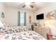 Second bedroom with twin beds, flat-screen TV, and coastal decor at 4773 Wild Iris Dr. # 5-202, Myrtle Beach, SC 29577