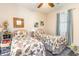 Guest bedroom with twin beds, nautical-themed bedding, and built-in storage at 4773 Wild Iris Dr. # 5-202, Myrtle Beach, SC 29577