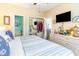 Main bedroom with king bed, ensuite bathroom access, and plenty of closet space at 4773 Wild Iris Dr. # 5-202, Myrtle Beach, SC 29577