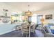 Kitchen and dining area with white table and chairs at 4773 Wild Iris Dr. # 5-202, Myrtle Beach, SC 29577