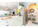 Kitchen with island, stainless steel refrigerator, and access to dining area at 4773 Wild Iris Dr. # 5-202, Myrtle Beach, SC 29577