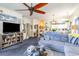 Living room with gray sectional sofa and kitchen view at 4773 Wild Iris Dr. # 5-202, Myrtle Beach, SC 29577