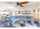 Spacious living room with gray sectional sofa and open layout at 4773 Wild Iris Dr. # 5-202, Myrtle Beach, SC 29577