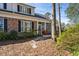 Charming brick home featuring a screened-in porch and a cozy backyard at 489-3 Golden Bear Dr. # 3, Pawleys Island, SC 29585
