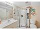 Bright bathroom with a glass shower door, white sink vanity, and matching toilet at 489-3 Golden Bear Dr. # 3, Pawleys Island, SC 29585