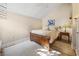 Cozy bedroom featuring a queen bed, hardwood floors, and natural lighting at 489-3 Golden Bear Dr. # 3, Pawleys Island, SC 29585
