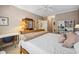 Bedroom featuring wood mirror, desk, and a comfortable bed at 489-3 Golden Bear Dr. # 3, Pawleys Island, SC 29585